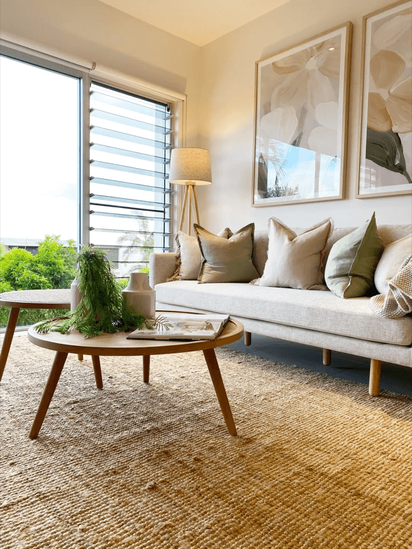 Hanging pictures in a livingroom Lounge with art on walls